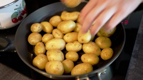 Fresh young potatoes in a pan ready to cook. Stock Footage 155633752