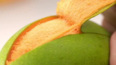 Fresh Zhanjiang Mango Peeling Process Tropical Fruit Stock Footage 330532948
