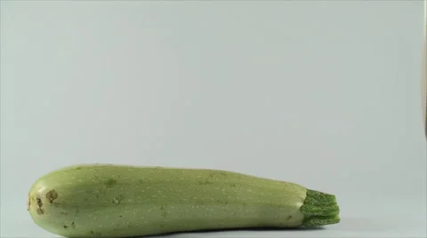 Fresh Zucchini On A White Surface, Isolated, Bio, Organic, Cuisine, Tilt Stock Footage 40617201