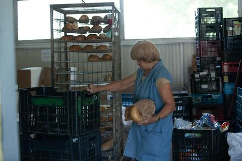 Freshly backed bread ready to be packed Foto stock
