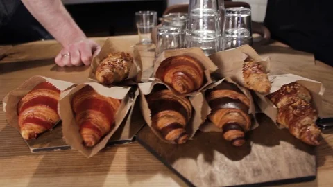 Freshly backed croissants on the table. Video stock 116735810