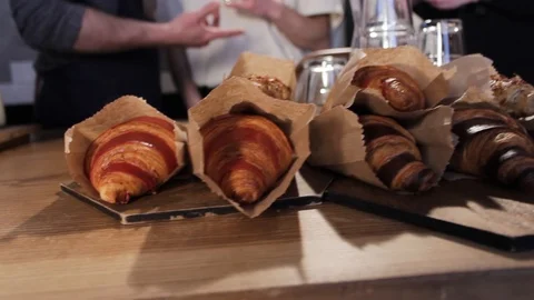Freshly backed croissants on the table. Video stock 116735834