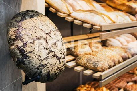 Freshly baked bread and bakery products on the counter Stock Photos