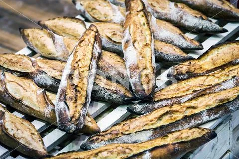 Freshly baked bread and bakery products on the bakery Stock Photos