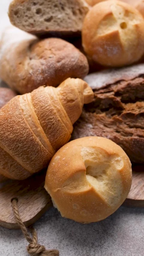 Freshly baked bread assortment top view Stockbeeldmateriaal 334722108