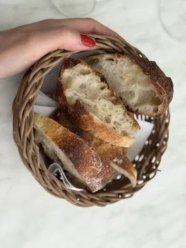 Freshly Baked Bread in a Basket Stock Photos