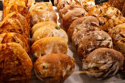 Freshly baked bread buns with crispy golden crust from sourdough, authentic.. Stock Photos