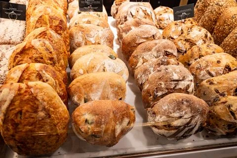 Freshly baked bread buns with crispy golden crust from sourdough, authentic.. Stock Photos