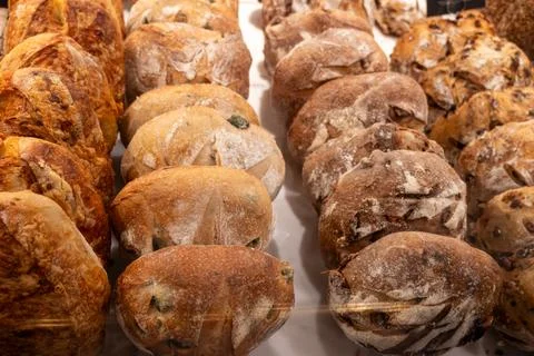 Freshly baked bread buns with crispy golden crust from sourdough, authentic.. Stock-Fotos