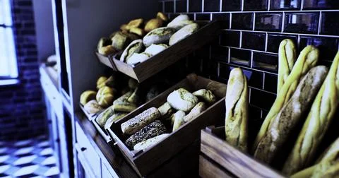 Freshly baked bread displayed in a rustic bakery in the afternoon light Stockillustratie