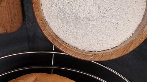Freshly baked bread loaf bun roll round long mix verity flour in wooden bow.. Stock Footage 258431943