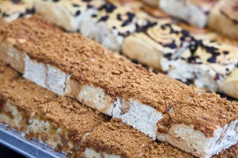 Freshly baked bread pudding slices with crumb topping Stock Photos
