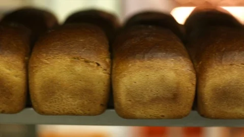 Freshly Baked Bread On Rack Video stock 105080271