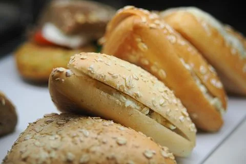Freshly baked bread rolls at a bakery Stock Photos