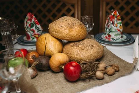 Freshly baked bread in rustic bakery with traditional oven. Food background Stock Photos