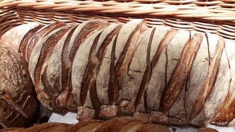 Freshly baked bread with scoring patterns.  Stock Photos