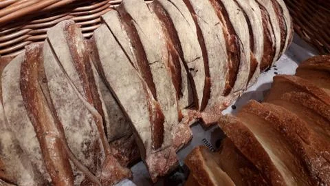 Freshly baked bread with scoring patterns Stock Photos