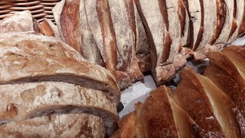 Freshly baked bread with scoring patterns Stock Photos