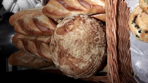Freshly baked bread with scoring patterns Stock Photos