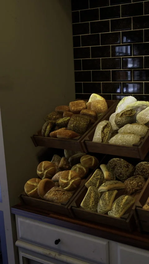 Freshly baked bread selection in a cozy bakery showcasing artisan loaves Stock Footage 331693282