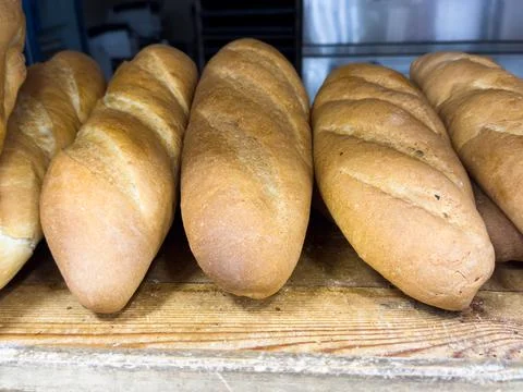 Freshly baked bread on the store counter, Armenian bread Matnakash, crispy lo Stock Photos