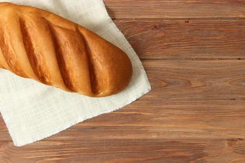 Freshly baked bread on the table. Stock Photos