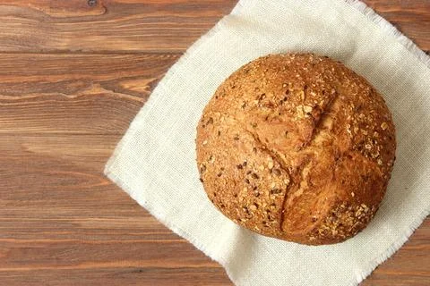 Freshly baked bread on the table. Stock Photos