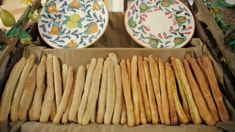 Freshly baked breadsticks basket Stock Footage 86737101