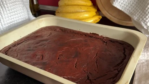 Freshly Baked Brownie in Large Baking Tray with Cracked Chocolate Surface in Stock Footage 345172802