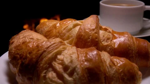 Freshly baked croissants with coffee for breakfast Stock Footage