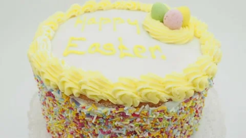 A Freshly Baked Easter Cake Rotating On A White Background 動画素材 151628215