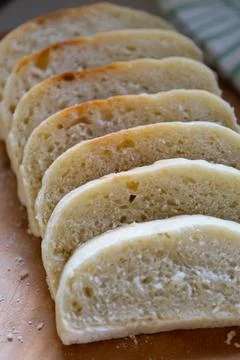 Freshly baked homemade bread on a rustic wooden background Stock Photos