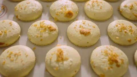 Freshly baked macaroons on a baking sheet. Stock Footage 233299289