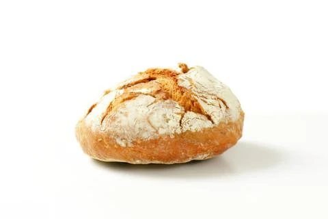 Freshly baked rustic bread on plain background Foto stock