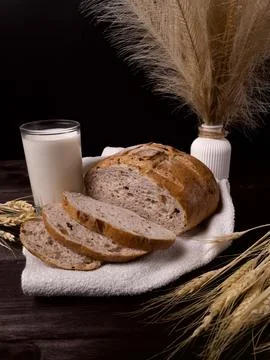 Freshly baked rustic bread with slices Stock Photos
