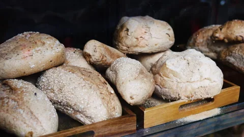 Freshly baked rustic sourdough bread display Video stock 341962670