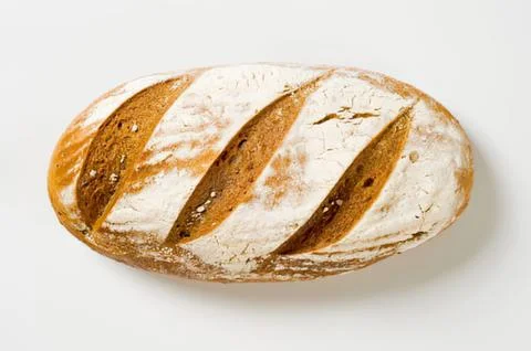 Freshly baked rustic sourdough bread loaf Stock Photos