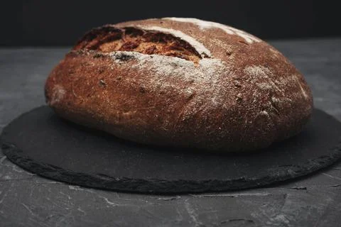 Freshly baked rye round bread close-up. Homemade bread. The concept of health Foto stock