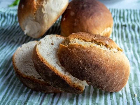 Freshly baked sliced bread on the table closeup. Stock Photos