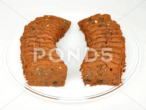 Freshly baked sliced plum cake Stock Photos