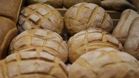Freshly baked white loaf of bread Stock Footage 146574214