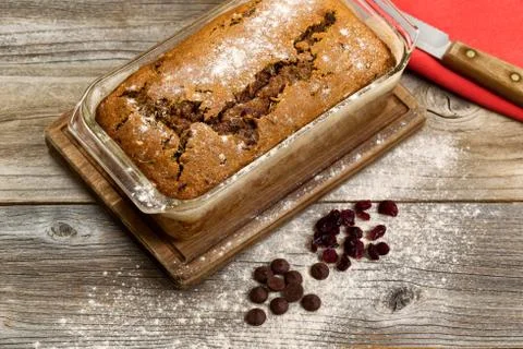 Freshly baked zucchini bread on rustic wooden boards Stock Photos