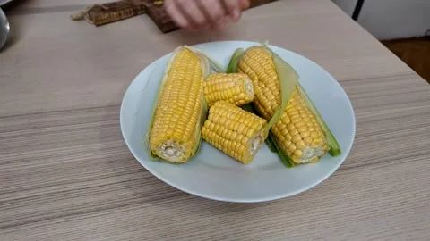 Freshly Boiled Corn on Plate Stock Footage 289011945