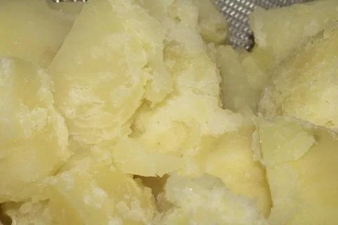 Freshly boiled potatoes ready to be mashed or roasted Stock Photos