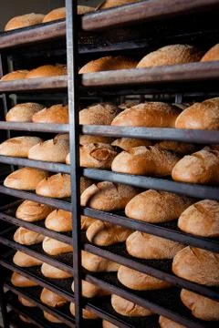 Freshly bread on a baking tray Stock Photos