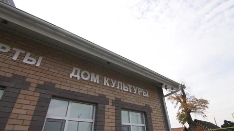 Freshly built brick structure with plastic windows and signature Stock Footage 293309929