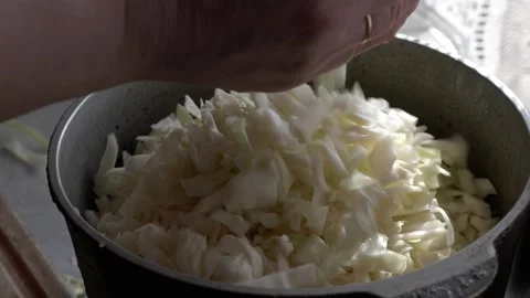 Freshly Chopped Cabbage is Now Ready for Your Cooking Adventures and Delicious Видео 302717674