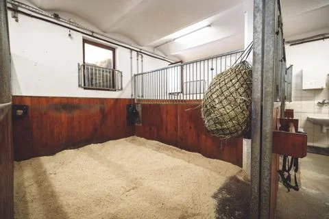 Freshly cleaned and empty stable at the ranch Stock Photos