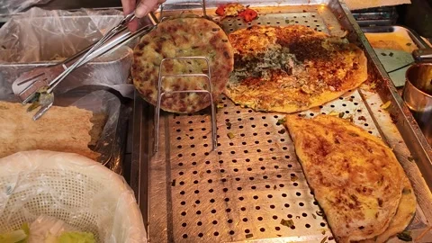 Freshly Cooked Flatbreads Drain at Shanghai Breakfast Stall Stock Footage 340176632