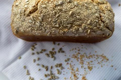 Freshly cooked home made bread, with sesame seed and sunflower Stock Photos